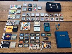 Game Boy Advance SP and Game Boy Color with a ton of games and accessories