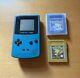 Gameboy Color Teal Blue With Pokémon Blue And Gold