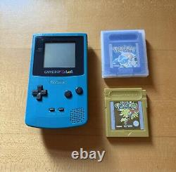 Gameboy Color Teal Blue With Pokémon Blue And Gold