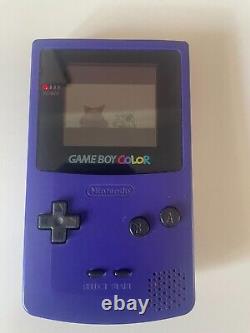 Gameboy color purple with Pokémon red