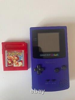 Gameboy color purple with Pokémon red