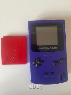 Gameboy color purple with Pokémon red