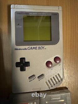 MAKE A OFFER Nintendo Game Boy Grey and Nintendo colour with games