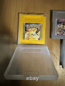 MAKE A OFFER Nintendo Game Boy Grey and Nintendo colour with games