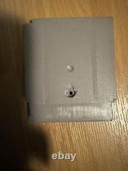 MAKE A OFFER Nintendo Game Boy Grey and Nintendo colour with games