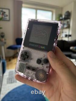 Nintendo CGB-001 Game Boy Color Handheld System Purple (clear / see-through)