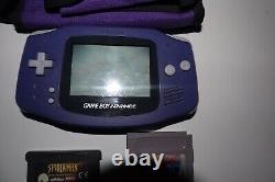 Nintendo Game Boy Advance Purple Handheld System & GameBoy Advance Purple Holder