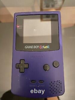 Nintendo Game Boy Handheld System Grape With rare original pokemon crystal game