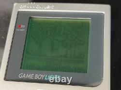 Nintendo Gameboy Light silver color console HGB-101, working -g0301
