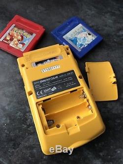 Yellow Nintendo Game Boy Color with POKEMON Yellow, Red, Blue Version Pal