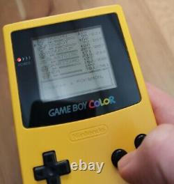 Yellow Nintendo Gameboy Color and official carry case