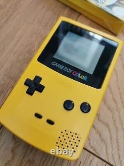 Yellow Nintendo Gameboy Color and official carry case