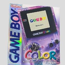 Boîte Gameboy Color Atomic Purple avec quelques manuels et console 2