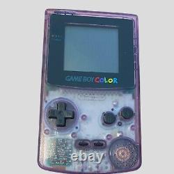 Boîte Gameboy Color Atomic Purple avec quelques manuels et console 2