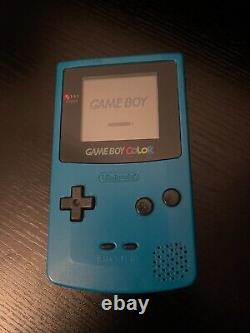 Console GameBoy Color Teal dans sa boîte, en excellent état, testé et fonctionnel, de style scandinave.