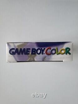 Console Nintendo Gameboy Color en boîte de couleur raisin violette, première impression avec boîte holographique.