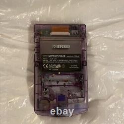 Console Nintendo Gameboy Color transparente violette atomique sans couvercle de batterie manquant