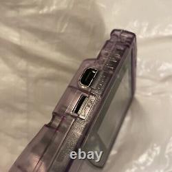 Console Nintendo Gameboy Color transparente violette atomique sans couvercle de batterie manquant