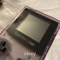 Console Nintendo Gameboy Color transparente violette atomique sans couvercle de batterie manquant