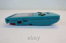 Console portable Nintendo Gameboy Color bleue en bon état de fonctionnement