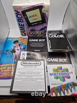 Game Boy Color violet atomique en boîte avec tous les manuels et la console