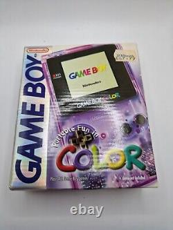 Game Boy Color violet atomique en boîte avec tous les manuels et la console