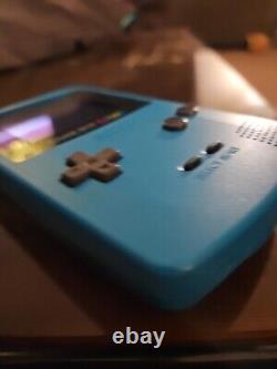 GameBoy Color immaculé, modèle Teal de 1998, No. CGB-001, 4 jeux, étui, chargeur