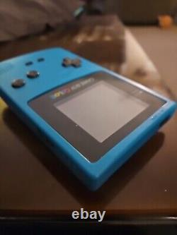 GameBoy Color immaculé, modèle Teal de 1998, No. CGB-001, 4 jeux, étui, chargeur