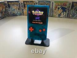 Gameboy Color avec mod écran IPS Q5 rétroéclairé, coque bleue transparente personnalisée et écran IPS orange