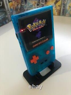 Gameboy Color avec mod écran IPS Q5 rétroéclairé, coque bleue transparente personnalisée et écran IPS orange