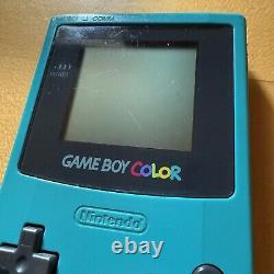 Gameboy Color bleu sarcelle avec Pokémon Bleu et Or