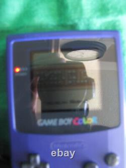 Grape Gameboy Color & Game + Case translates to 'Gameboy Color et jeu vigne + étui' in French.