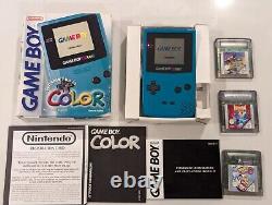 Lot rare de manuels et jeux Nintendo Game Boy Color en boîte turquoise