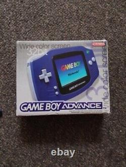 Nintendo Game Boy Advance système portable violet en boîte avec inserts, jamais utilisé