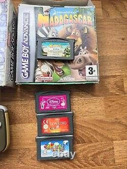 Système de console portable Nintendo Game Boy Advance violette. Lot de 4 jeux Mario inclus dans la boîte.