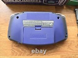 Système de console portable Nintendo Game Boy Advance violette. Lot de 4 jeux Mario inclus dans la boîte.