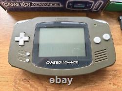 Système de console portable Nintendo Game Boy Advance violette. Lot de 4 jeux Mario inclus dans la boîte.