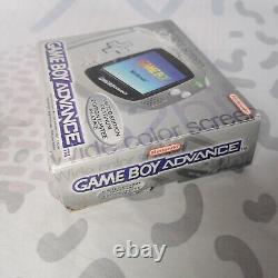 Système de jeu portable Nintendo Game Boy Advance Platinum en boîte avec manuel testé