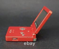 Système portable Game Boy Advance SP Flame Red + BUNDLE DE JEUX & CHARGEUR