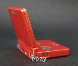 Système portable Game Boy Advance SP Flame Red + BUNDLE DE JEUX & CHARGEUR