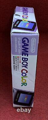 Système portable Nintendo Game Boy Color Atomic Purple en boîte avec manuel