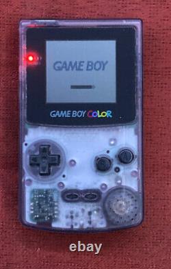 Système portable Nintendo Game Boy Color Atomic Purple en boîte avec manuel