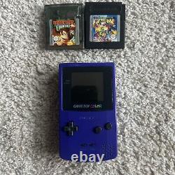 Système portable Nintendo Game Boy raisin avec 2 jeux