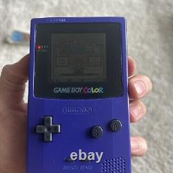 Système portable Nintendo Game Boy raisin avec 2 jeux